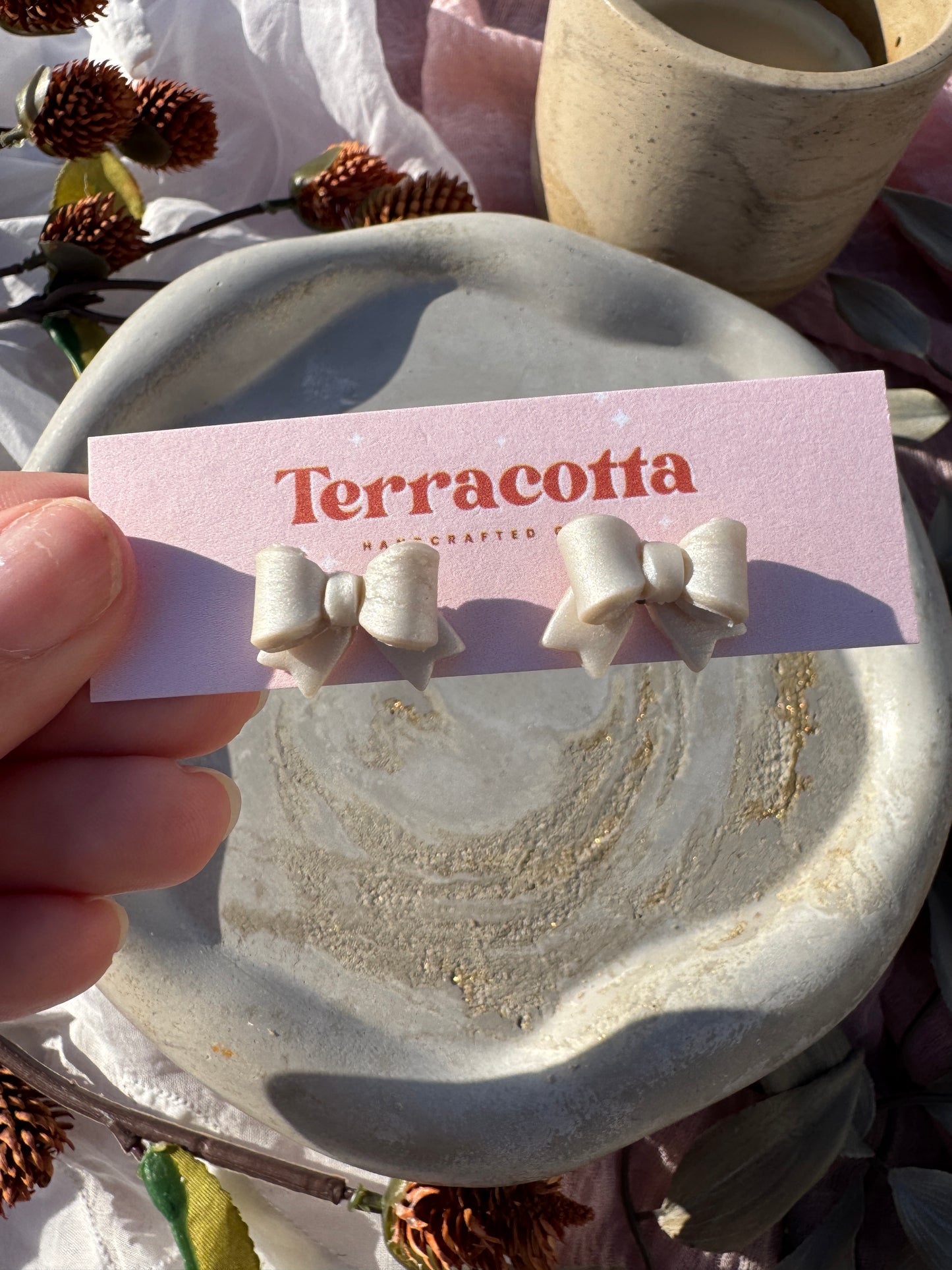 Pearlescent White Bow Stud